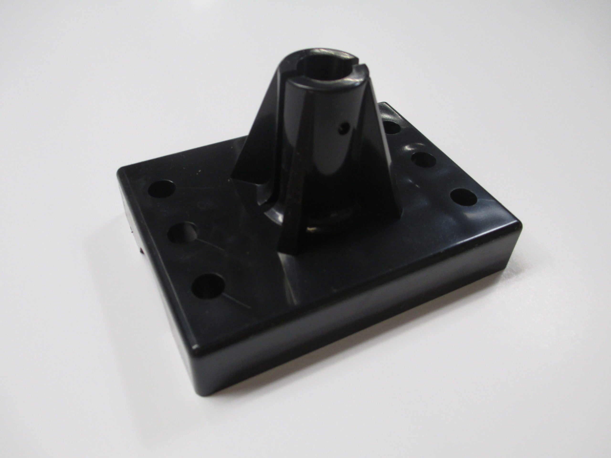 Black anemometer wind measurement tool mounting base with multiple screw holes and a central threaded hole.