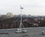 Vantage Vue weather station mounted on rooftop with mounting tripod