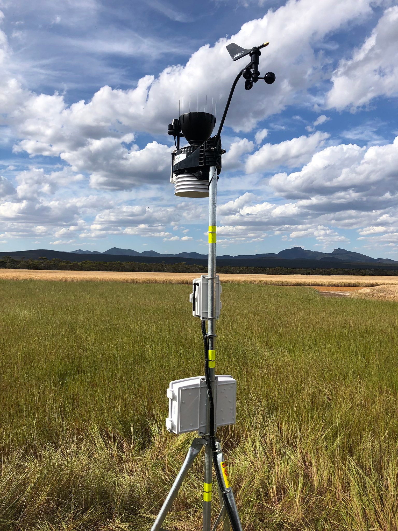 Vantage Pro2 weather station on mounting tripod in field